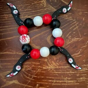 Red, Black, and White Beaded Bracelet